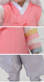 Close up of pink and gray korean boys hanbok