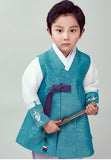Young boy wearing a sky blue hanbok and holding a fan