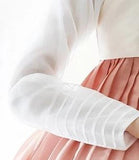 Closeup of Woman wearing Custom Women's Bridal Hanbok in Floral Sheer Pearl style
