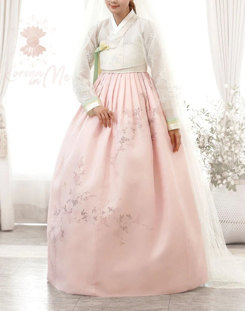 Woman wearing Custom Women's Bridal Hanbok in Peach Tulle style