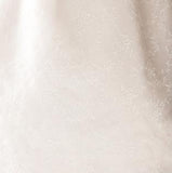 Closeup of fabric of custom womens bridal hanbok in lace and pastel pink style