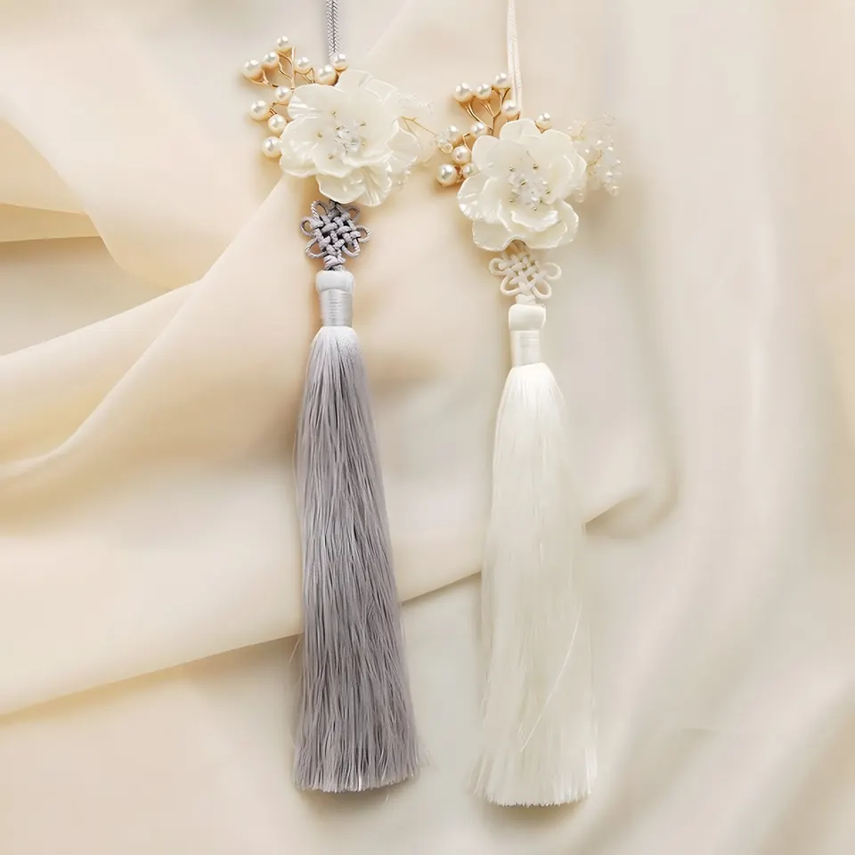 The Suseonhwa Norigae, accessory from the collection, product photograph