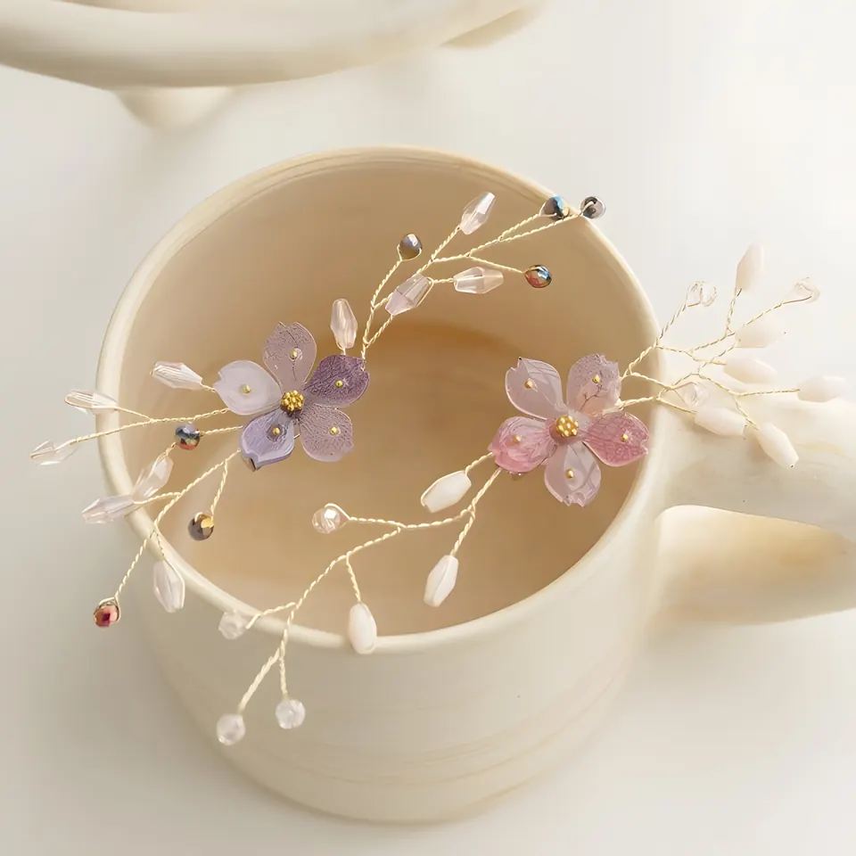 The Single Bead Flower Brooch, accessory from the collection, product photograph