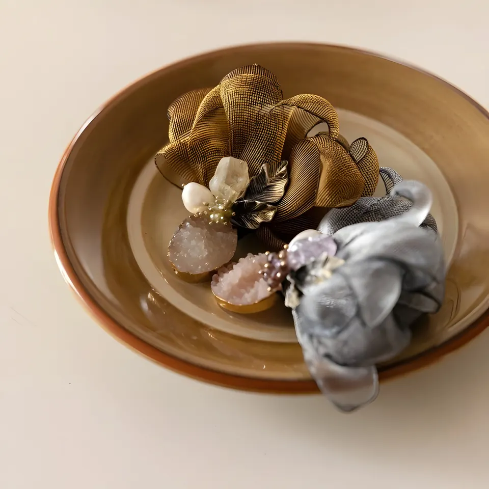The Danha Marble Wing Brooch, accessory from the collection, product photograph