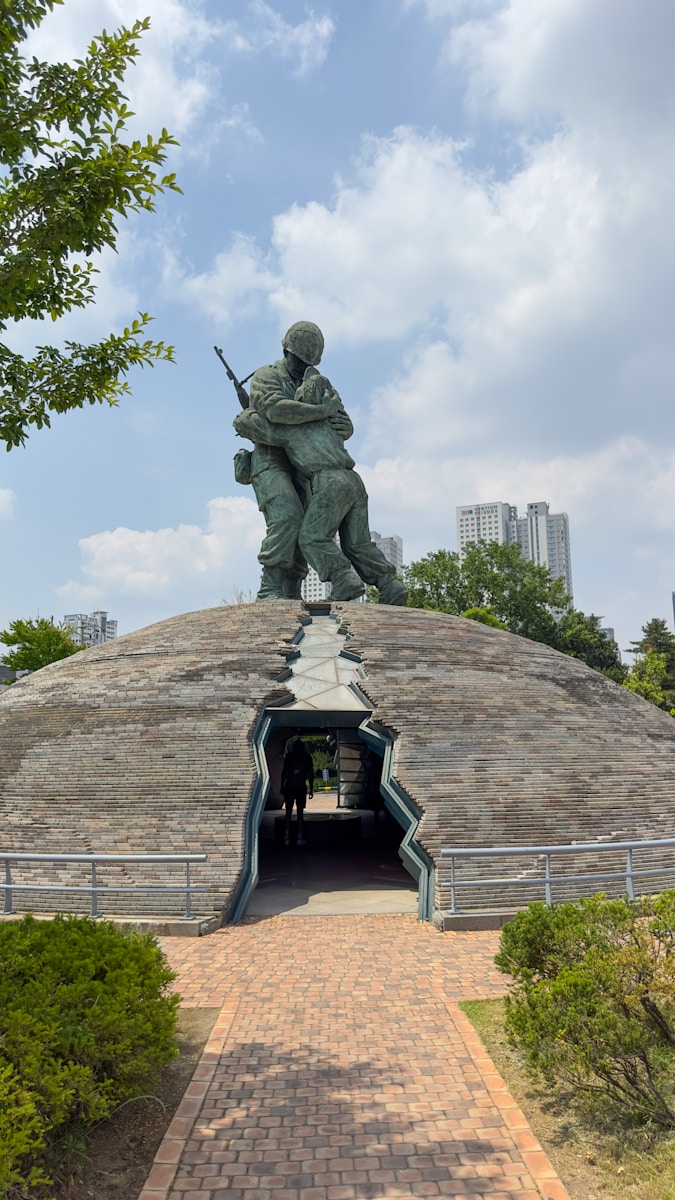 a statue of a soldier holding a rifle